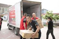 我乐家居橙色课桌公益路的第12年：书写数万儿童的大梦想