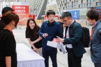 中国品牌日丨行业唯一！冠珠华珍岩板闪现人民日报美好博物馆，彰显民族品牌魅力