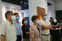 市委统战部二级巡视员、市欧美同学会党组书记李霞一行到访书香门地集团调研